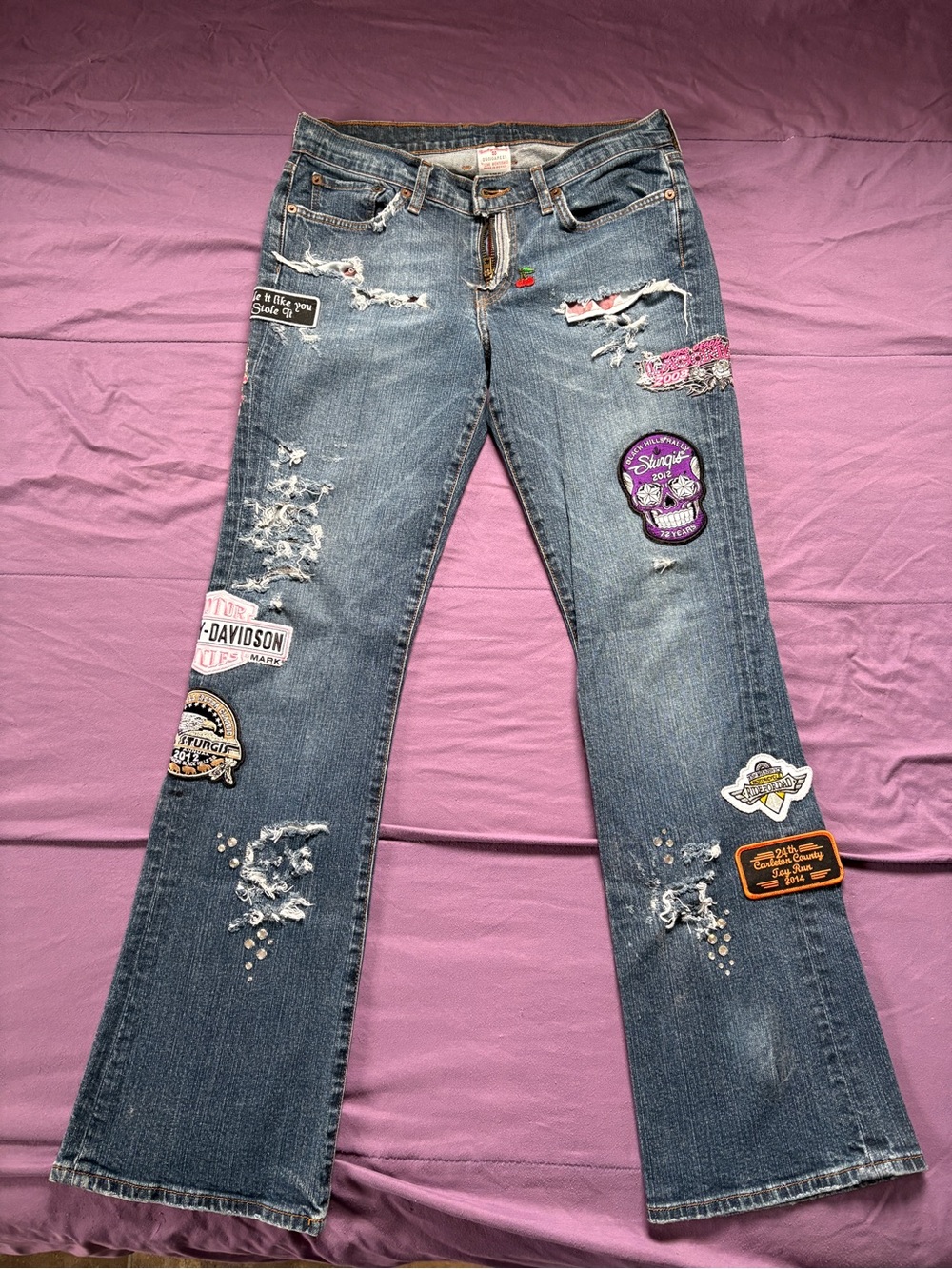 Blue Jeans, CUSTOM with Patches FROM Harley Davidson Bike Rallies. 
Vintage.